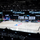 Officials stand beside an empty court after the scheduled start of game five between the Milwaukee Bucks and the Orlando Magic in the first round of the 2020 NBA Playoffs at AdventHealth Arena at ESPN Wide World Of Sports Complex on August 26, 2020 in Lake Buena Vista, Florida. (Photo by Ashley Landis-Pool/Getty Images)